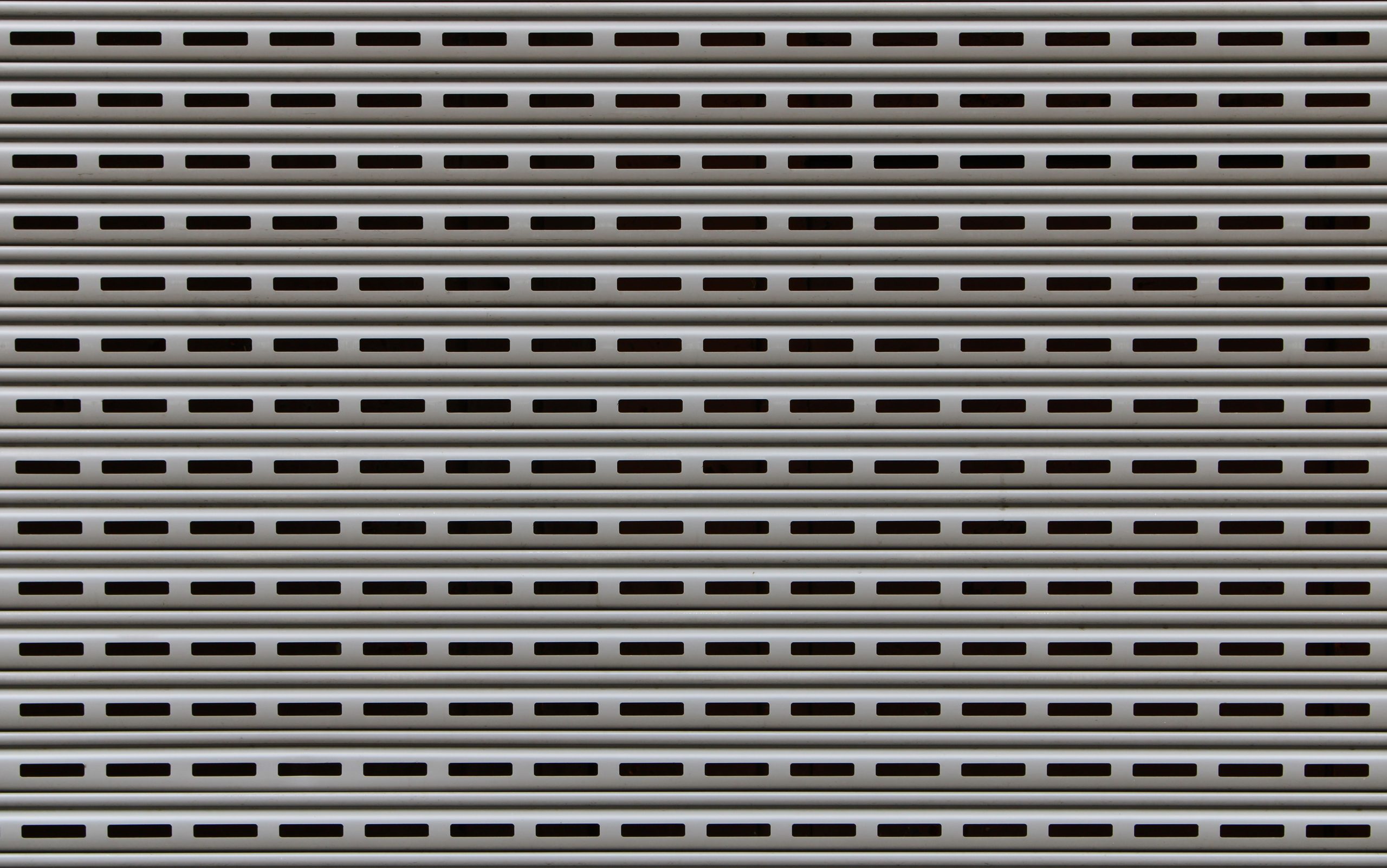 Porte garage metallique motifs horizontaux textures